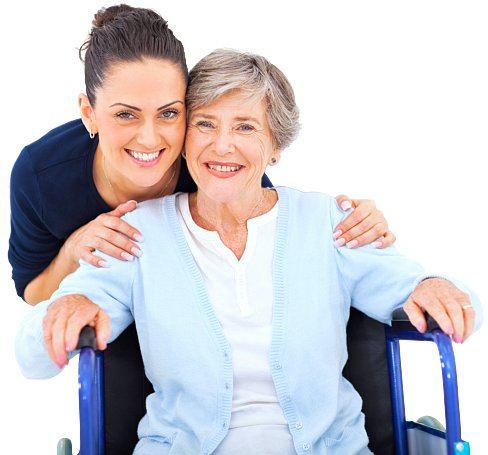 caregiver hugging senior woman in a wheelchair
